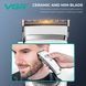 Машинка для стрижки VGR V-880C WHITE, EXTERNAL ROTOR MOTOR, MIM Blade, 11 насадок, док-станция 11278 фото 5