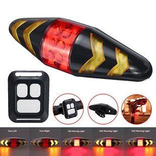 Велофонарь LY-0378 с указанием поворотов (red+yellow), ЗУ micro USB, встр. аккум., пульт управления, CR2032 8389 фото